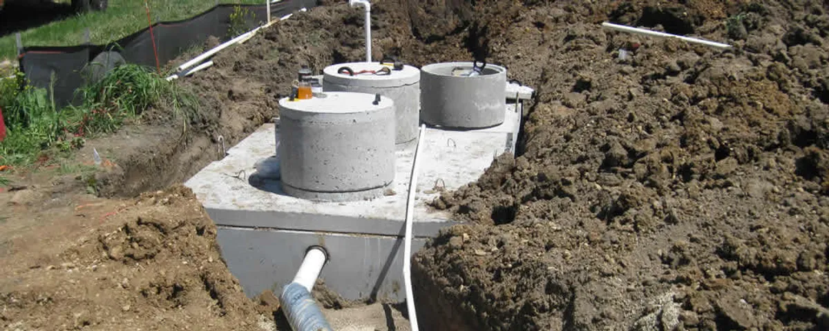 Septic system repair and installation site with tank access ports in Pittsburgh, PA